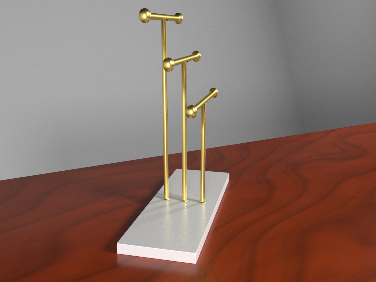 Golden jewelry holder on mahogany desk preview image 2